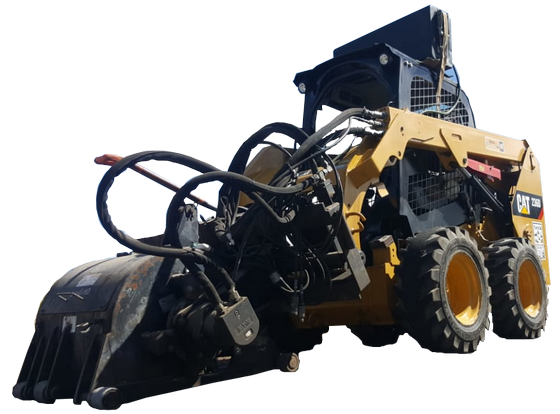 Minicargador Caterpillar con aditamento hidráulico